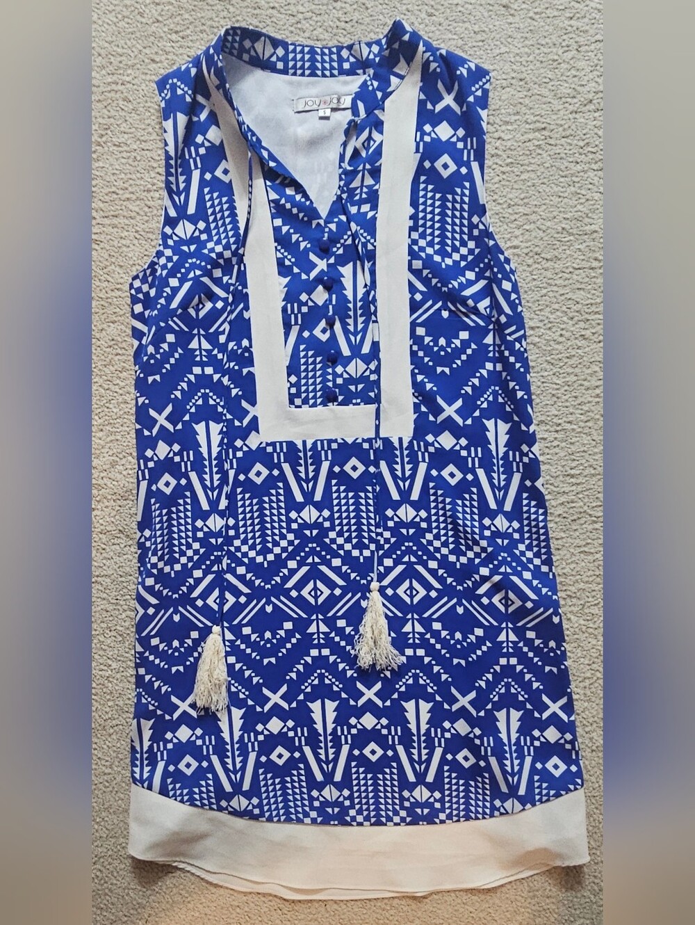 JOY JOY vibrant blue and white geometric print dress from this boutique Brand